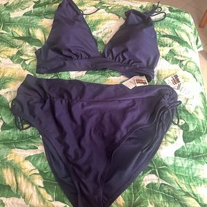 Plus size two piece bathing suit. 3x bottom. 1 x top.  Super cute!  Navy blue